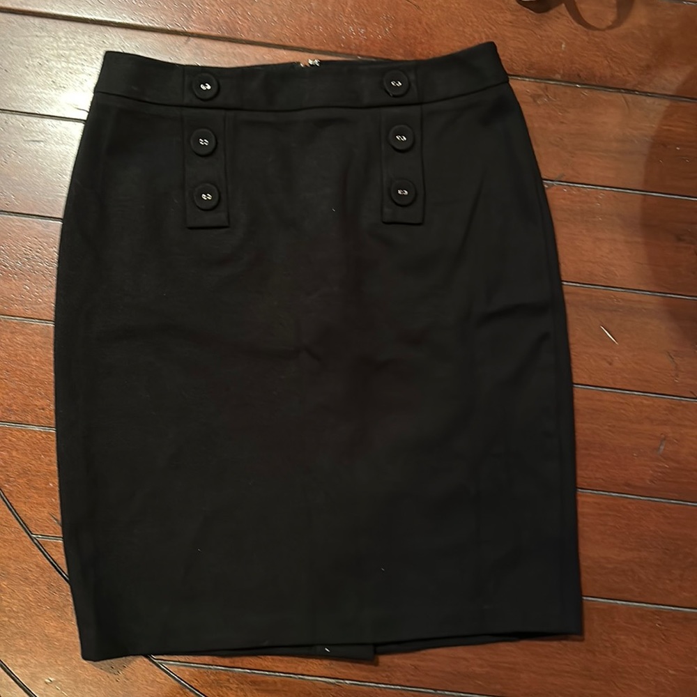 Talbots Black Skirt.  Nice detail with bottom in front.  Back zip, hook & eye.